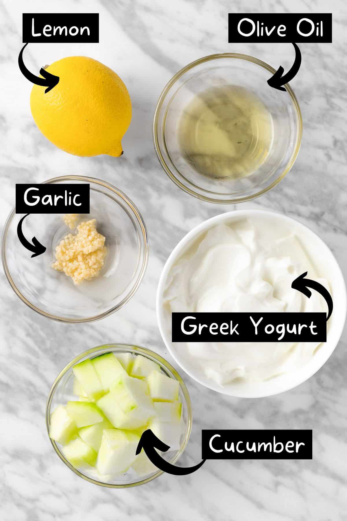 The ingredients needed to make the tzatziki dressing.
