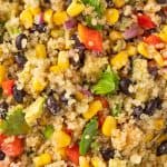 Up close view of a Southwest Quinoa Salad with avocado, corn, red pepper and black beans.