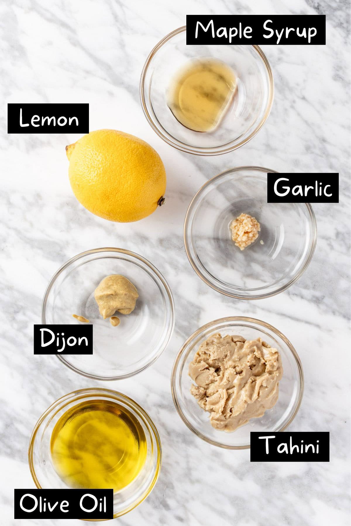 The ingredients needed to make the tahini lemon salad dressing recipe.