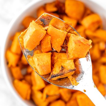 A close up spoonful of Sweetgreen sweet potatoes.