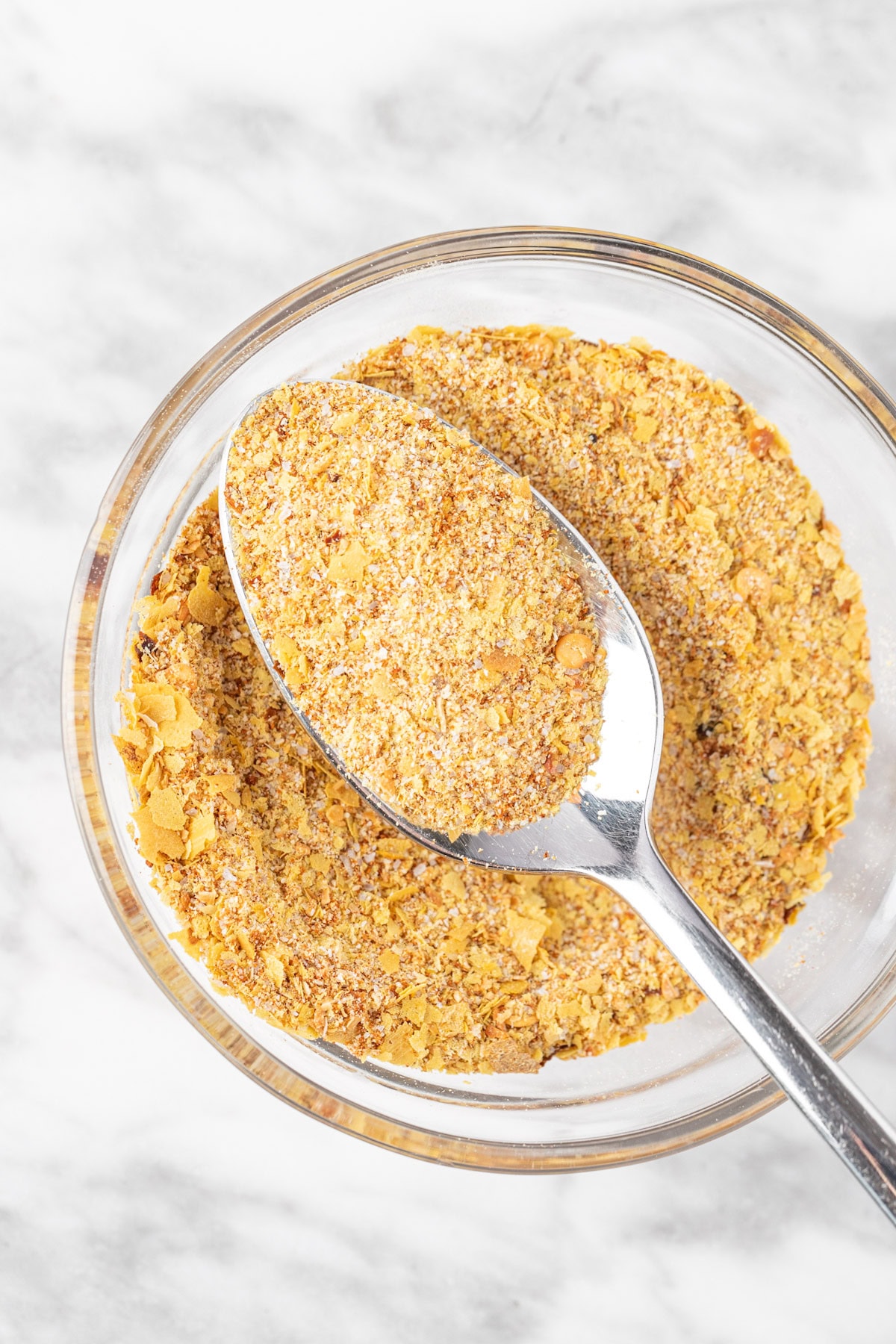 Up close view of a spoonful of Sweetgreen’s umami seasoning.